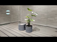 Plantador de argila de fibra sustentável para exposições florais exuberantes