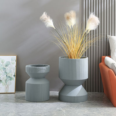 comprar Descubra a beleza dos plantadores de argila de fibra para suas plantas internas e externas online manufacture