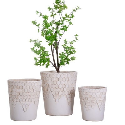 comprar vaso de fibra de argila redondo bege neutro com padrão de favo de mel liso leve durável baixa manutenção vaso de flores decoração de escritório de shopping hotel Villa feriado projeto de paisagismo de jardim online manufacture