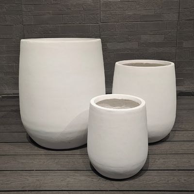 comprar Design moderno e minimalista Grande plantador redondo de fibra de argila Ecológico Atacado Venda quente para uso em shopping com chão suspenso online manufacture