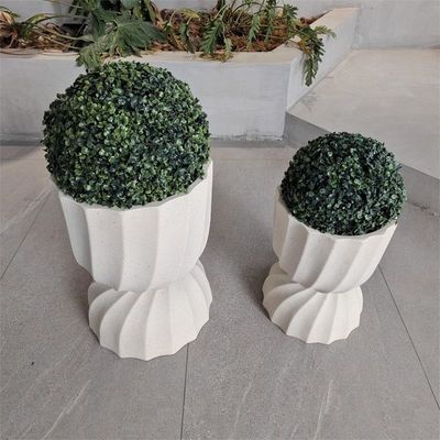 Plantação redonda de fibra de argila em estilo moderno com superfície texturizada e material resistente ao clima